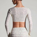 Kaunistatud pikakäised crop top valges
