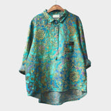 Ivonne | Premium Blus, millel on lillemuster