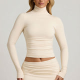 Ivory värvi modal ruched backless turtleneck top