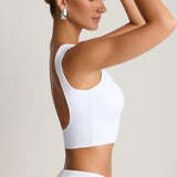 Kardinaalne avatud seljaga tank-top valges