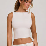 Valge kõrge kaelusega avatud seljaga crop top